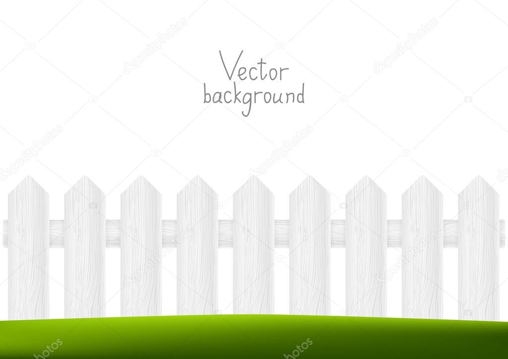 White fence with green grass