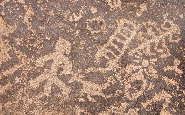 Petraglyph symbolem člověka — Stock fotografie