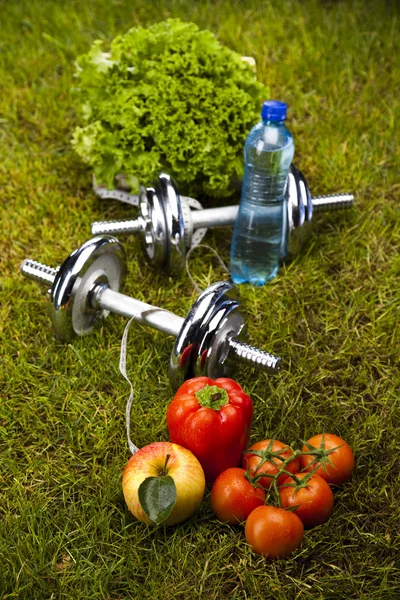 Fitness dieet, vitaminen en groen gras — Stockfoto