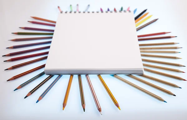 Notepad with school supplies — Stock Photo, Image