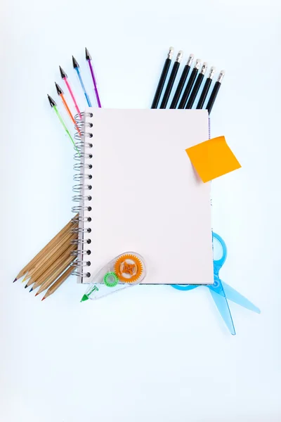 Notepad with school supplies — Stock Photo, Image