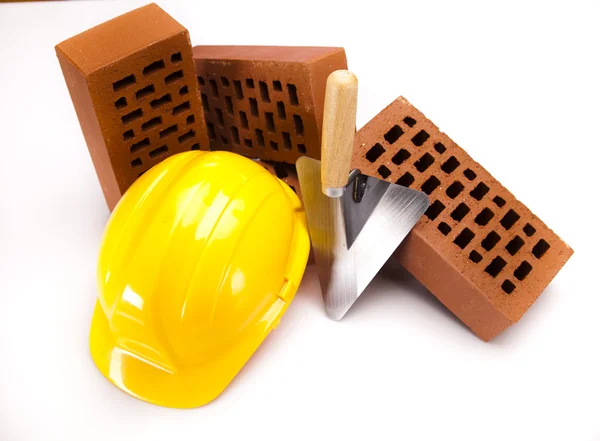 Building background, trowel and bricks — Stock Photo, Image