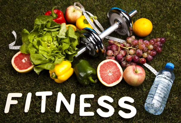 ダイエットやフィットネス、ビタミンでダンベル — ストック写真