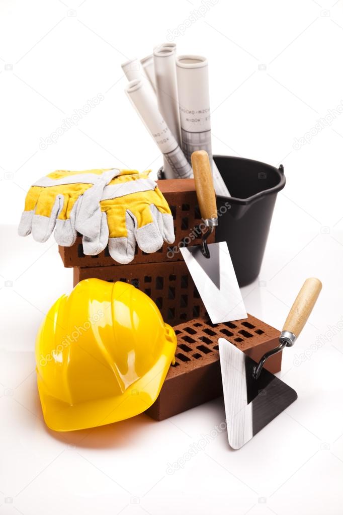Construction plans and blueprints, bricks