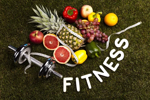 Fitness dieet, vitaminen en groen gras — Stockfoto