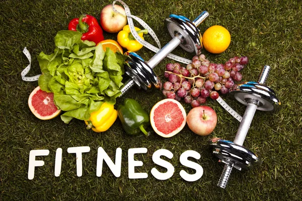 Fitness diet, vitamins and green grass — Stock Photo, Image