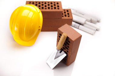 Tuğla, mala aracı ve inşaat planları