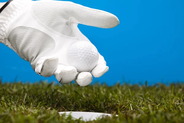 Mano y pelota de golf —  Fotos de Stock