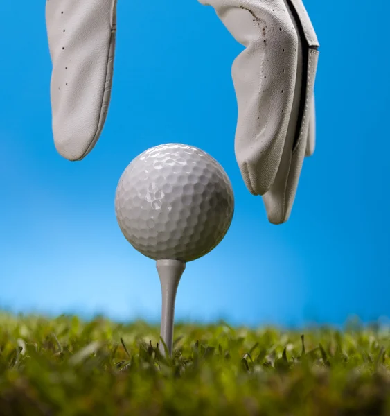 Mano y pelota de golf — Foto de Stock