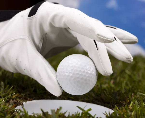 Kéz- és golf labda — Stock Fotó