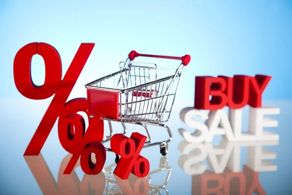 Shopping supermarket cart, percent sign — Stock Photo, Image