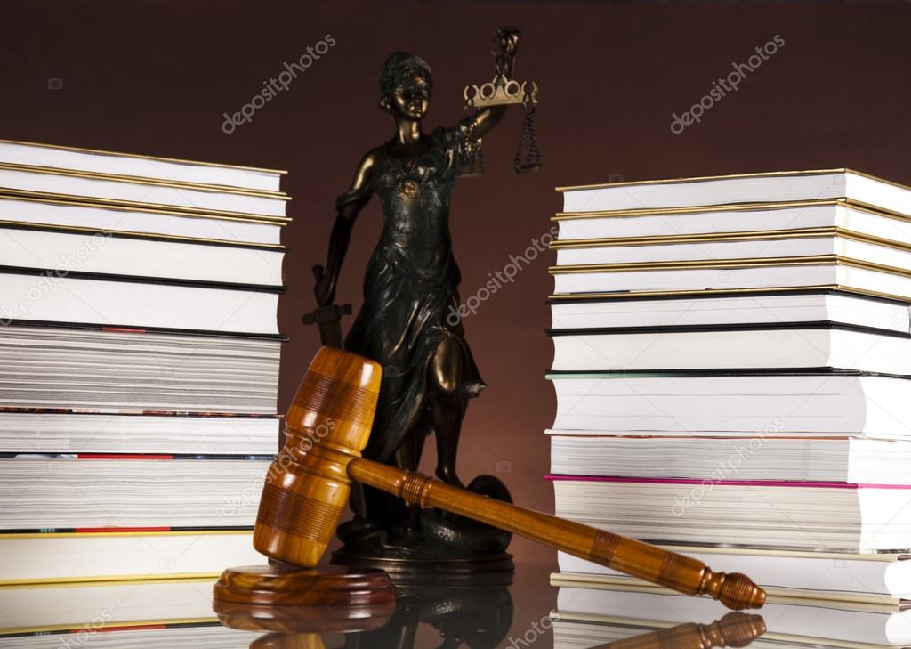 Judges wooden gavel and law books