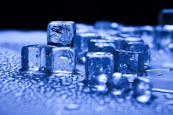 Blue and shiny ice cubes — Stock Photo, Image