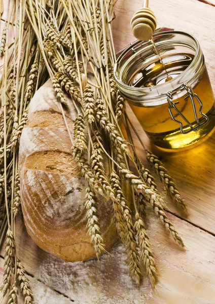 Pan y abrir un frasco de miel — Foto de Stock