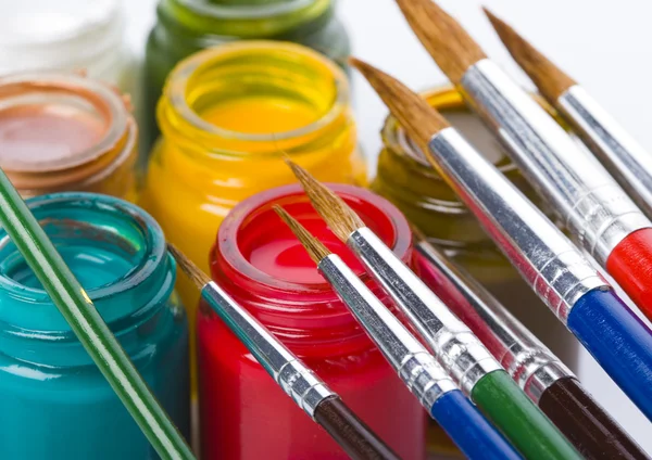 Paints and brushes — Stock Photo, Image