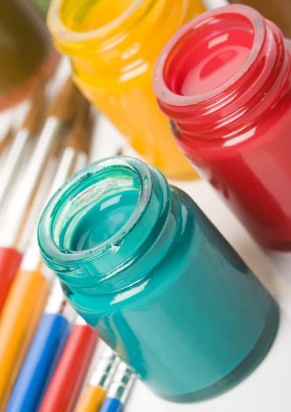 Paints and brushes — Stock Photo, Image