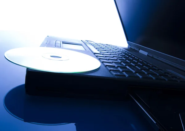 Laptop with CD — Stock Photo, Image