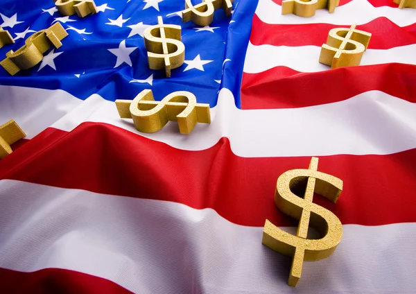 Segni di bandiera e dollari degli Stati Uniti — Foto Stock