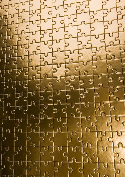 Gold puzzle background — Stock Photo, Image