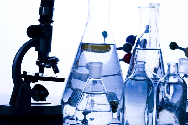 Glass in laboratory & microscope — Stock Photo, Image