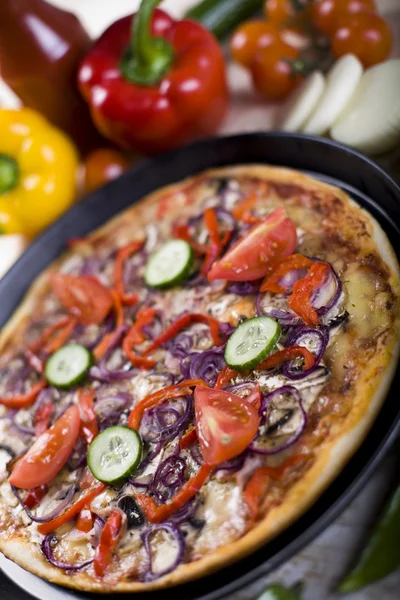 Supreme pizza in pan — Stock Photo, Image