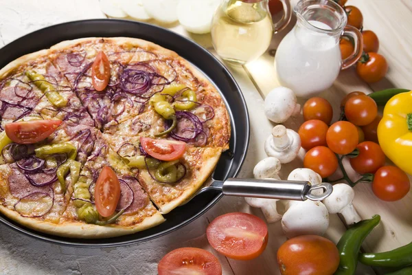 Tomato pizza and italian kitchen — Stock Photo, Image