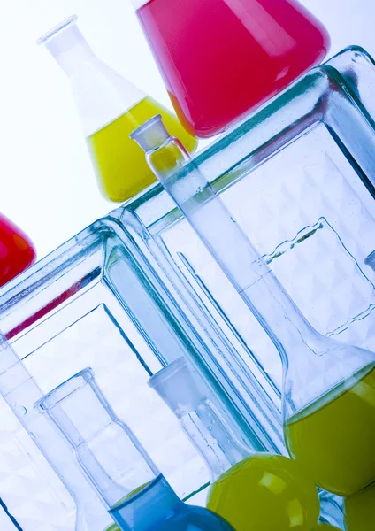 Laboratory flasks with fluids of different colors — Stock Photo, Image