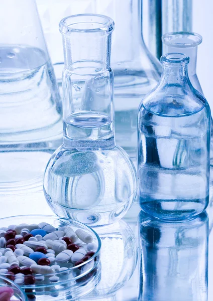 Laboratory glassware with drugs Stock Picture