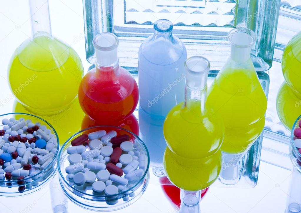 Laboratory flasks with drugs