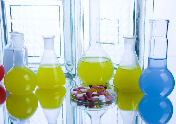 Laboratory flasks with drugs — Stock Photo, Image