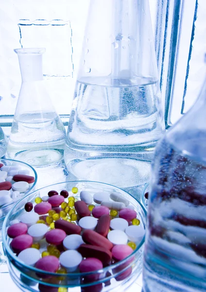 Laboratory glassware with drugs Royalty Free Stock Photos