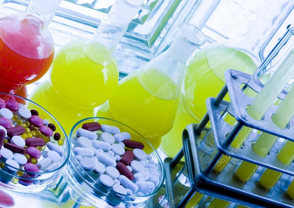 Laboratory flasks with drugs