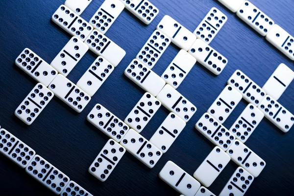 Domino dollars — Stock Photo, Image