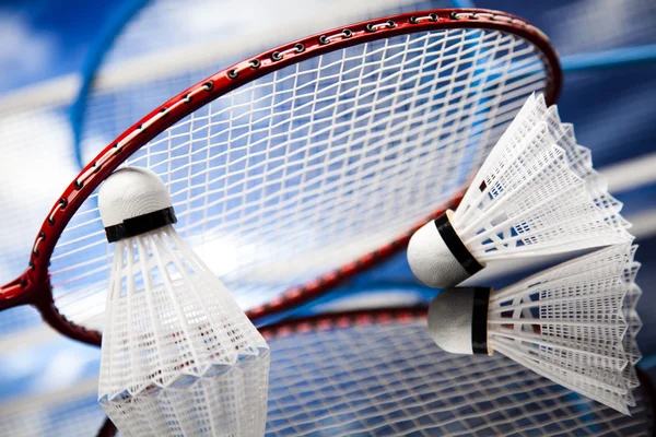 Shuttlecock on badminton racket — Stock Photo, Image