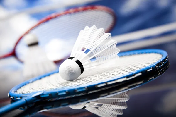 Shuttlecock on badminton racket — Stock Photo, Image