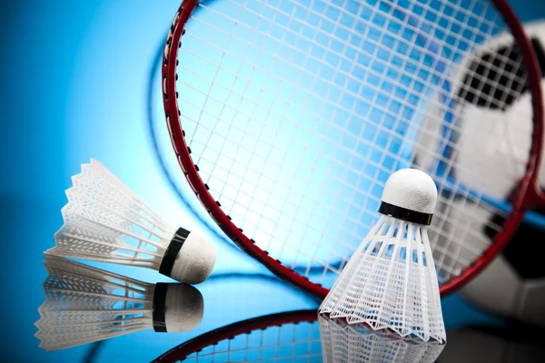 Shuttlecock on badminton racket — Stock Photo, Image