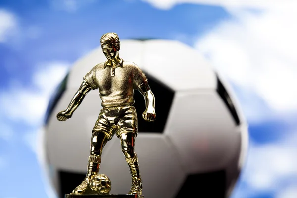 Figurine & Soccer ball — Stock Photo, Image