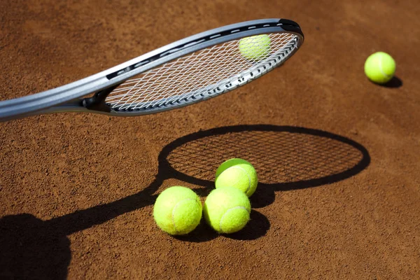 Sport, tennisracket en balletjes — Stockfoto