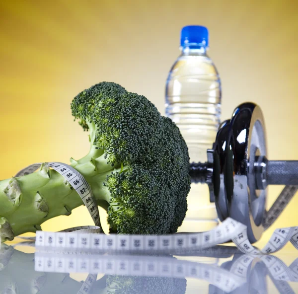 Dieta e fitness, manubrio con vitamina, tramonto — Foto Stock