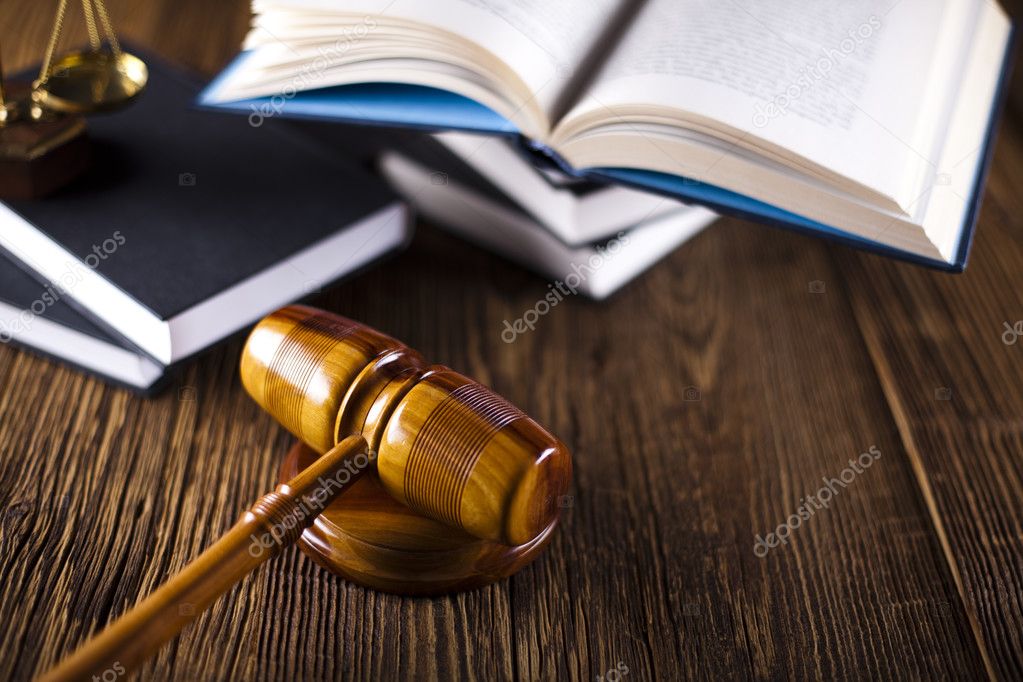 Judges wooden gavel and law books