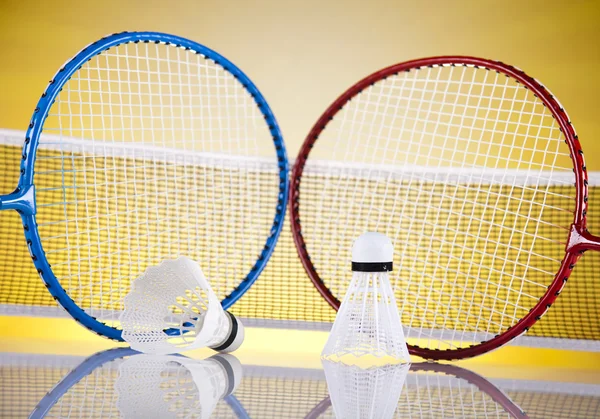 Shuttlecock on badminton racket — Stock Photo, Image