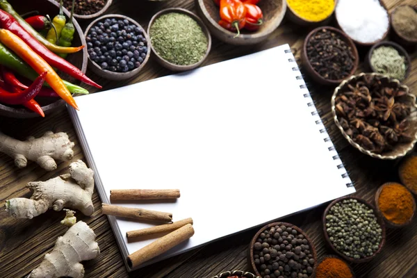 Cookbook and spices — Stock Photo, Image