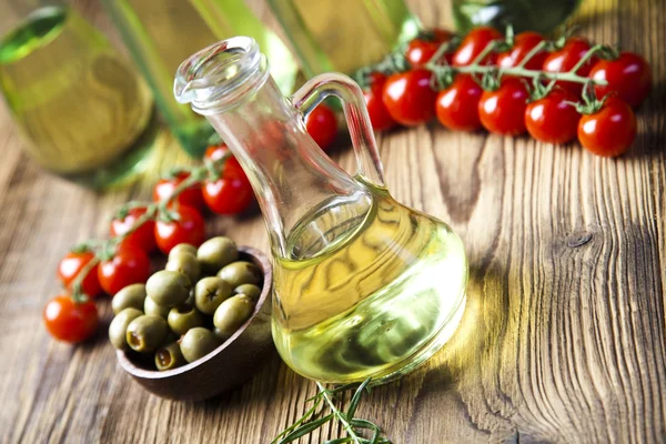 Olive oil with tomatoes — Stock Photo, Image