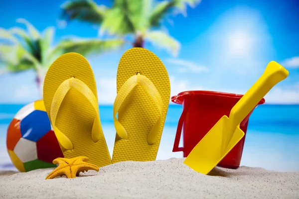 Sand beach and flip flops — Stock Photo, Image