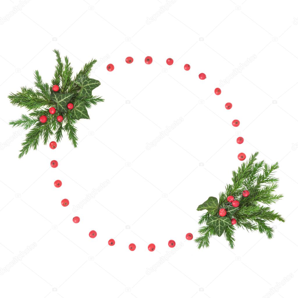 Natural abstract Solstice, Christmas New Year wreath, eco friendly nature concept symbol with juniper fir leaf sprigs, ivy and holly with red berries on white background. Copy space.