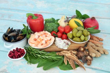 Immune system boosting health food with seafood, vegetables, fruit, herbs, spice on rustic wood. Foods very high in antioxidants, anthocyanins, protein, flavonoids, fibre, vitamins, minerals, omega 3. clipart