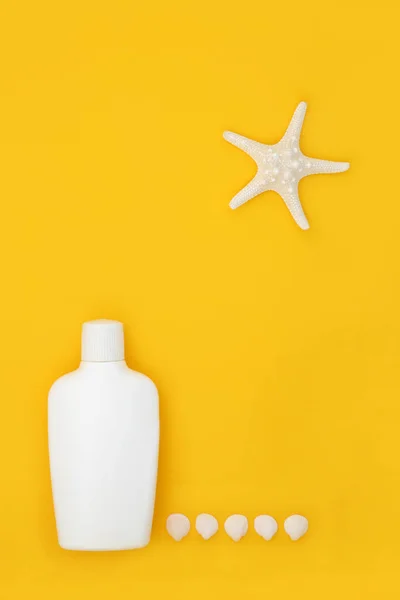 Sunscreen Suntan Lotion Bottle Summer Sunbathing Protection Yellow Background Starfish — Stock Photo, Image