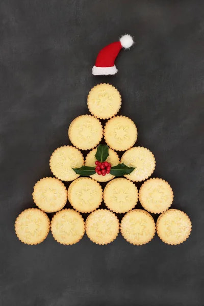 Festive Christmas Tree Concept Shape Mince Pies Santa Hat Winter — Stock Photo, Image