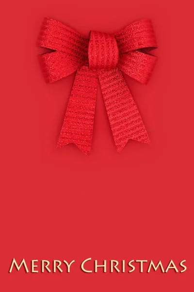 メリークリスマス赤い弓リボンの背景 お祝いの休日の季節のための伝統的な最小クリスマス組成 — ストック写真
