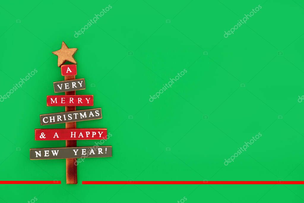 Eco friendly retro wooden rustic Christmas tree. Old fashioned bauble decoration on green background with red stripe. Minimal design for Xmas and New Year holiday season